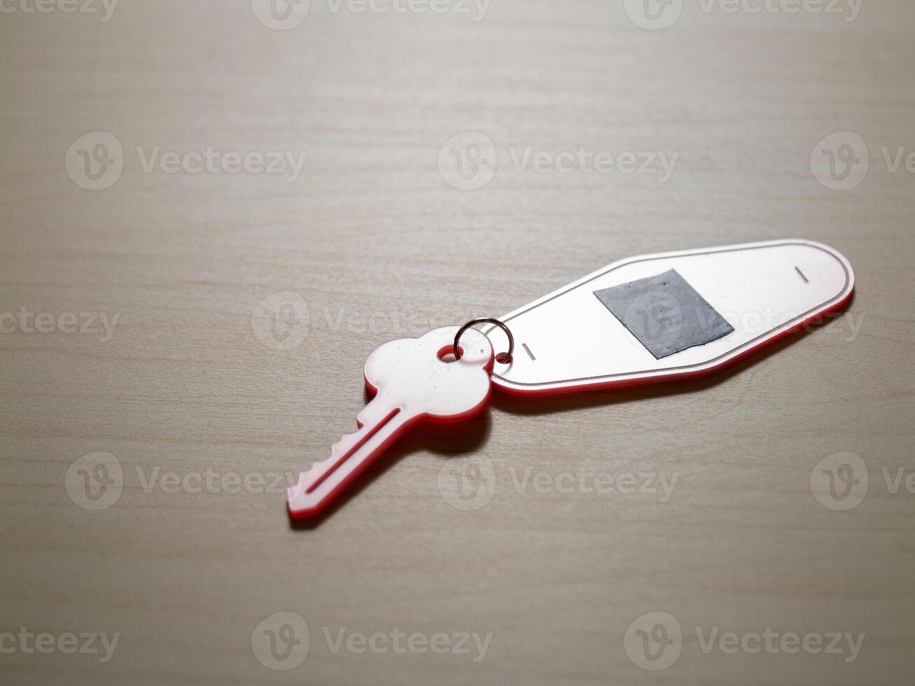 Key on table capturing everyday moments in a minimalist home office photo