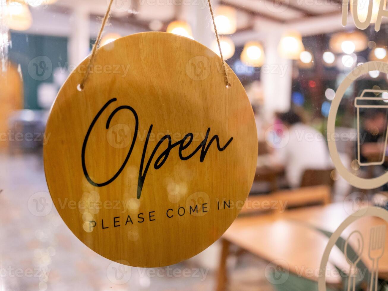 Welcoming evening scene at urban with open sign in cozy atmosphere photo