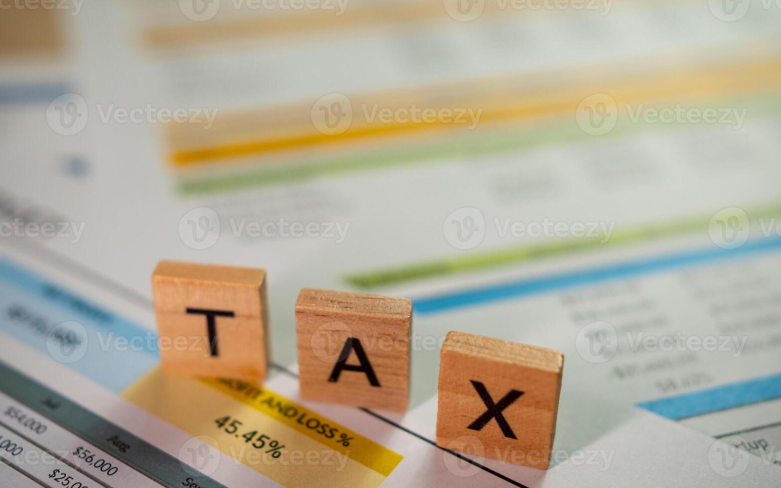 Business tax strategies analyzing financial reports in a corporate office setting photo