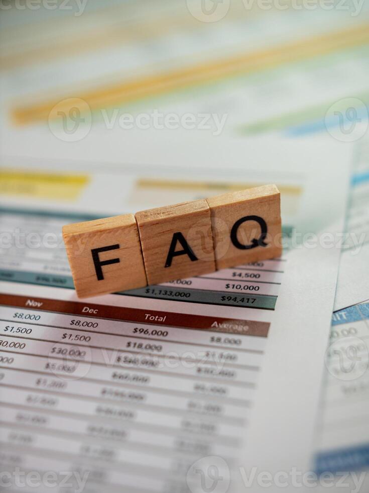 Business faq insights navigating financial documents office environment informational guide photo