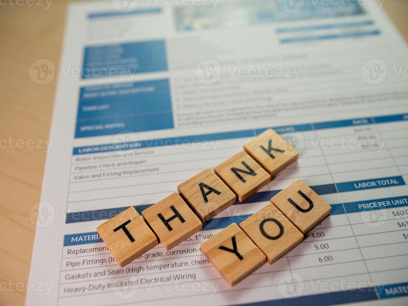 Business appreciation event thank you note and invoice in office environment photo