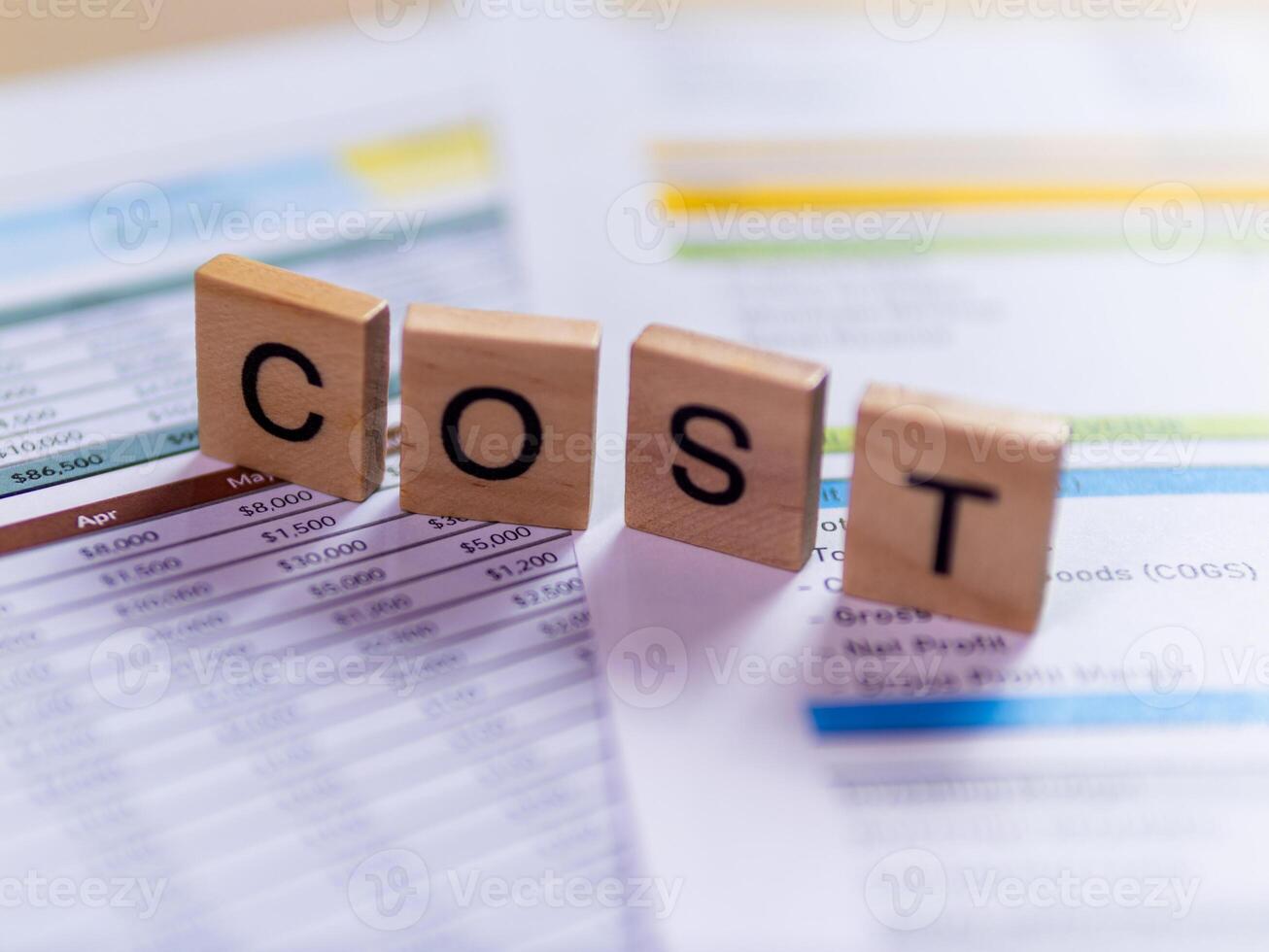 Business cost analysis using financial reports office environment document photo