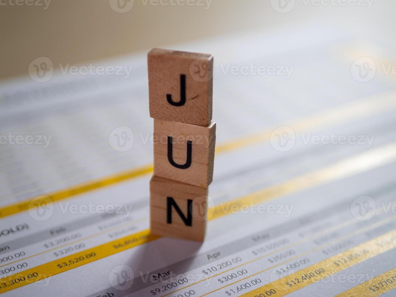 Close-up view june financial planning and budgeting office desk document photo
