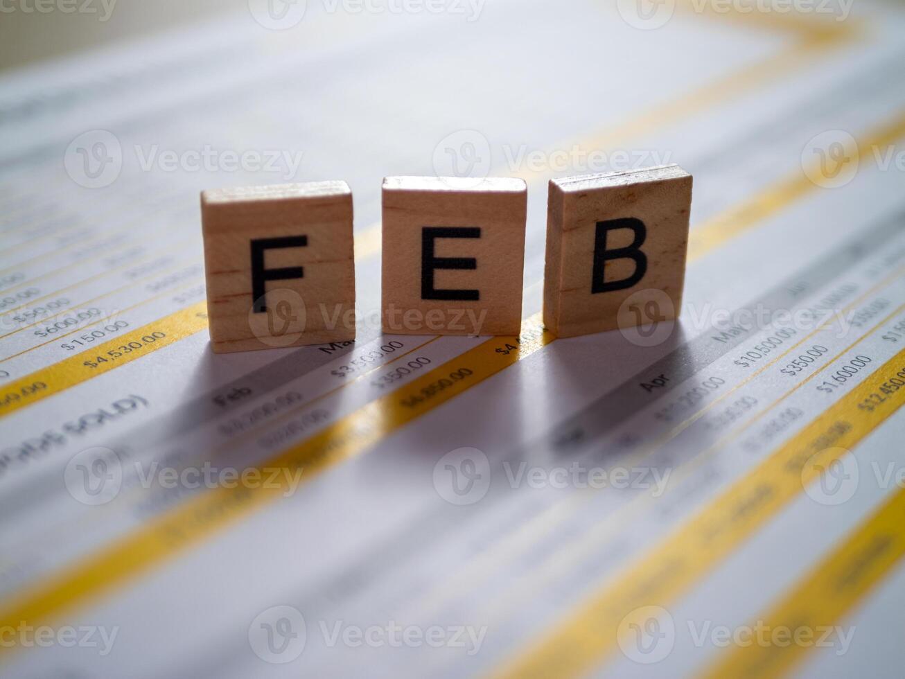 February financial overview office environment document analysis informative desktop perspective photo