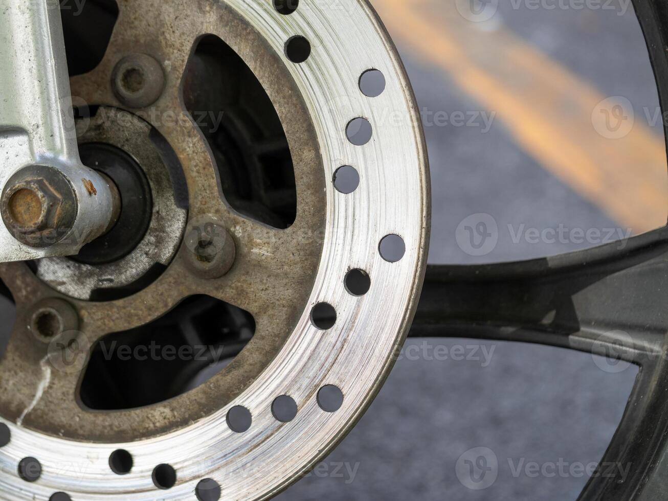Maintenance action motorcycle brake system urban garage mechanical image close-up view photo