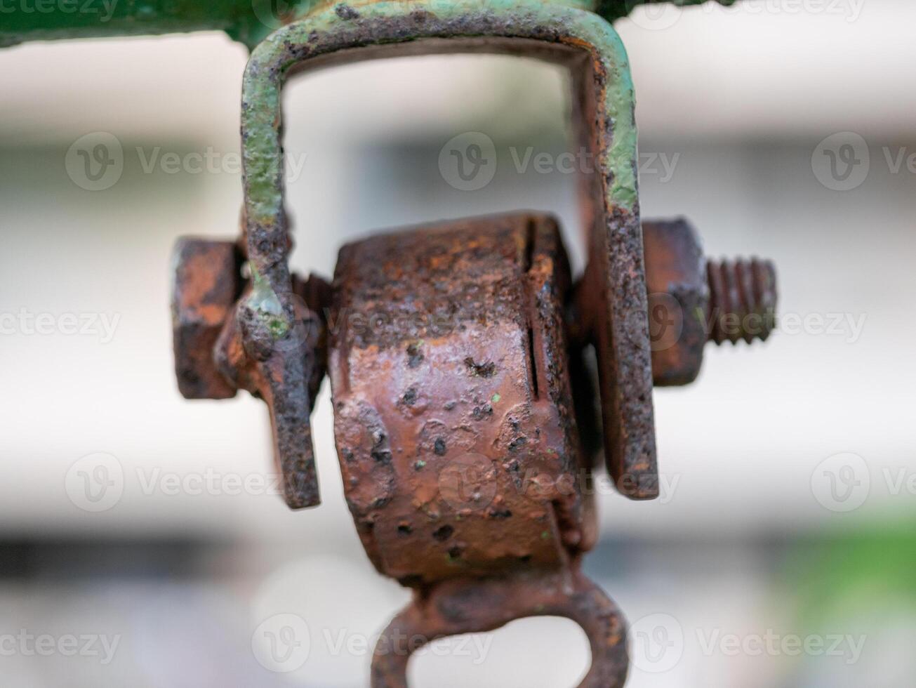 Rusty pulley mechanism macro industrial detail showcasing functionality in urban environment photo