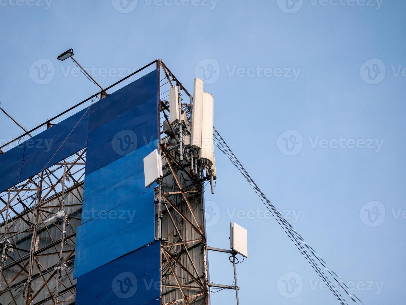 Elevated view of urban telecommunication equipment installation and infrastructure connectivity photo