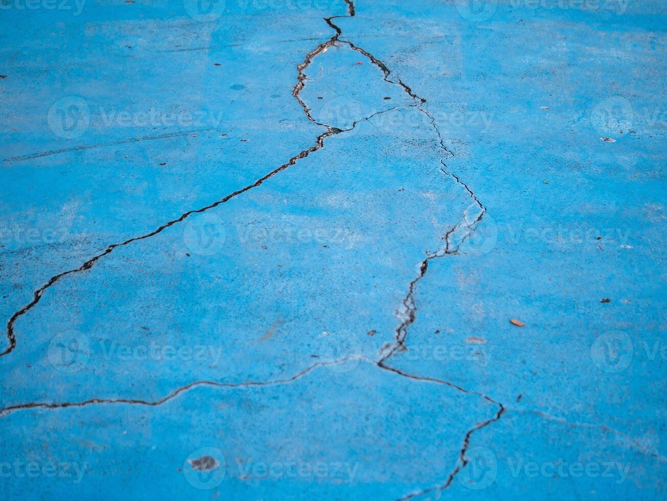 Cracked blue concrete surface urban location texture image outdoor setting abstract viewpoint photo