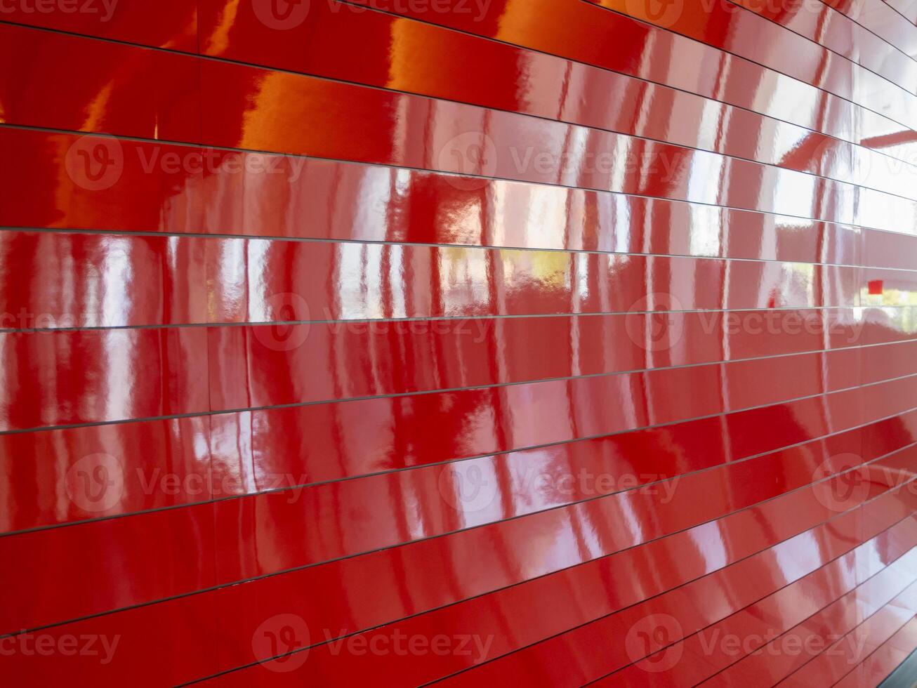 Modern gallery interior featuring vibrant red wall art installation close-up view photo