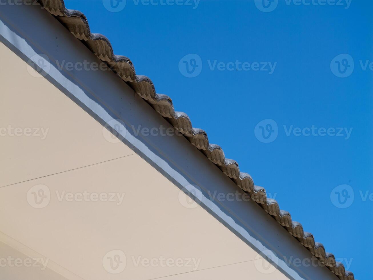 Roof edge detail against clear blue sky architectural outdoor perspective minimalist design photo