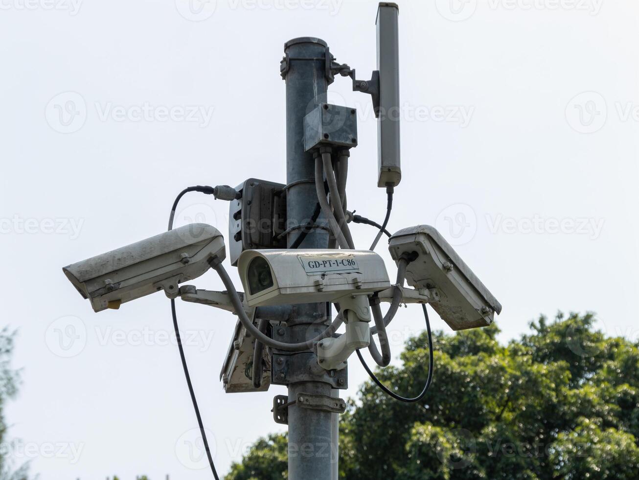 Surveillance technology installing outdoor monitoring systems in urban areas photo