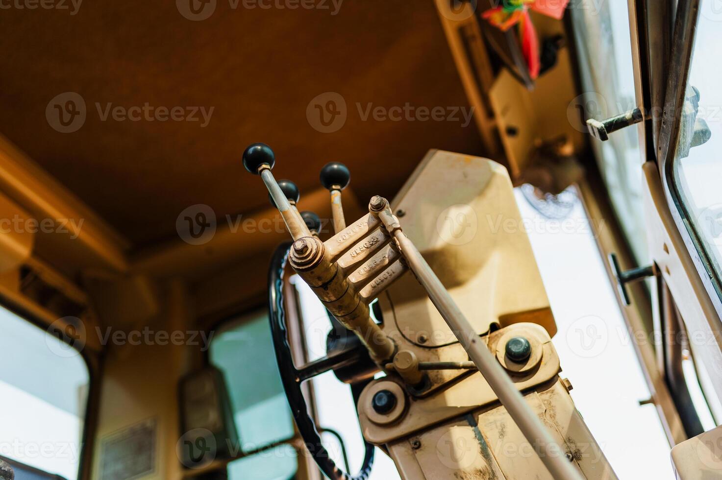 Engineering concept close-up of heavy machinery control panel in construction environment photo