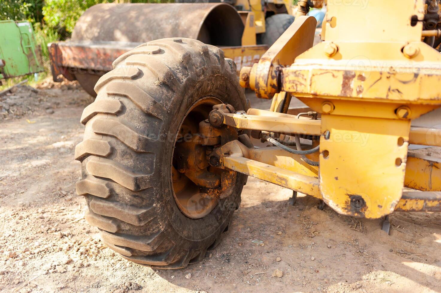 Industrial efficiency heavy machinery action at a roadwork construction zone photo