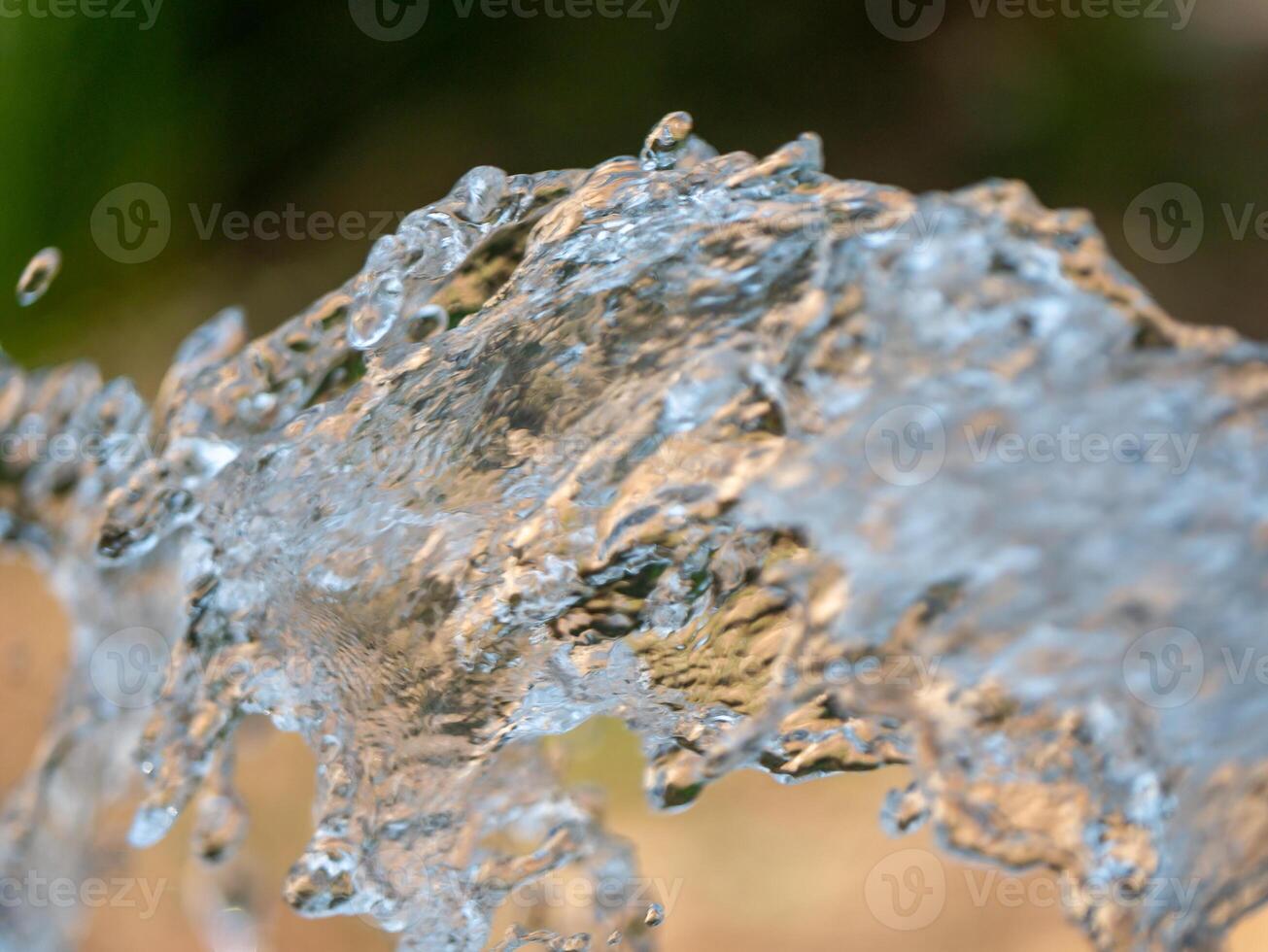 Dynamic water splash action outdoor setting nature close-up view refreshing concept photo