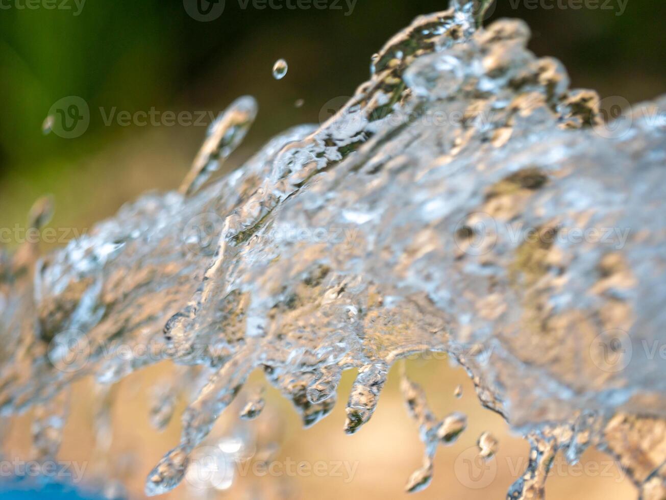 Dynamic water motion splash - high-resolution close-up in natural outdoor environment photo