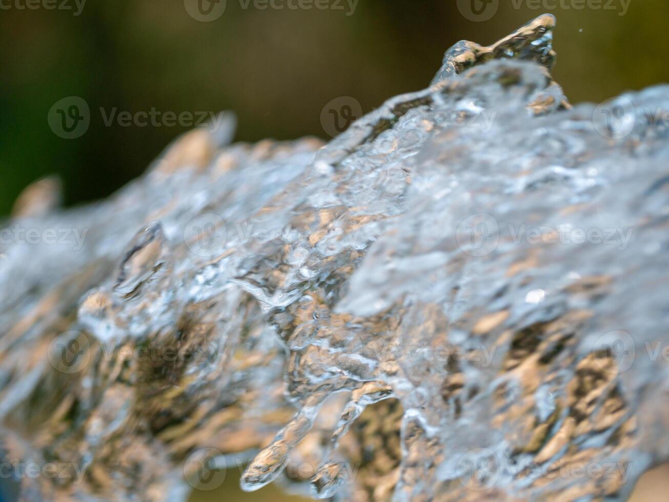 Flowing water action nature scene macro crisp environment up-close view natural beauty photo