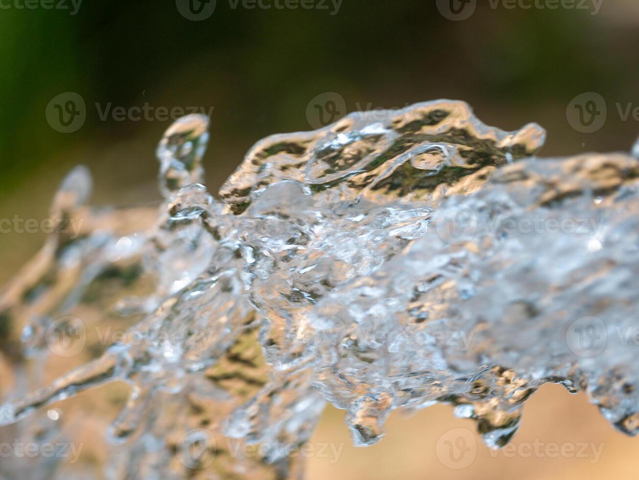 Water splashing action natural setting close-up outdoor environment dynamic viewpoint photo