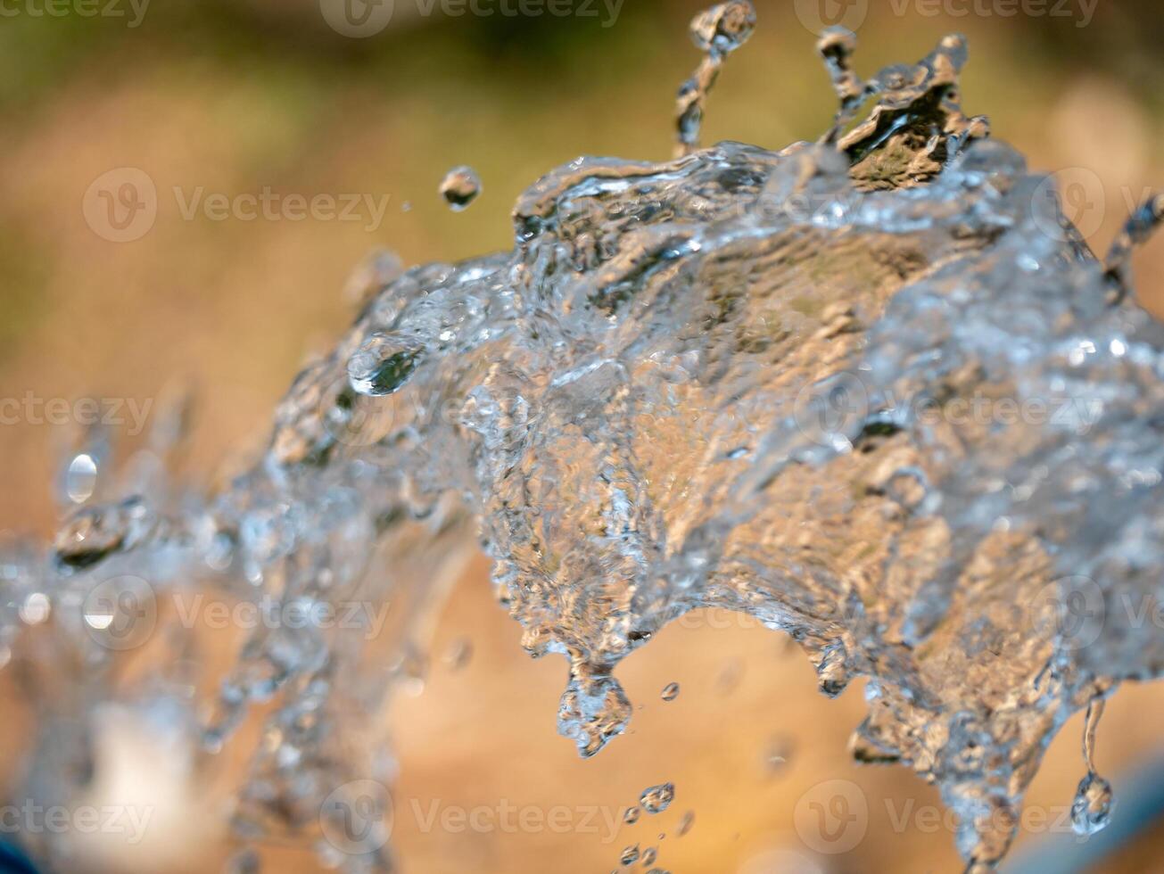 Water splashing action nature scene close-up outdoor environment dynamic view fluid motion photo