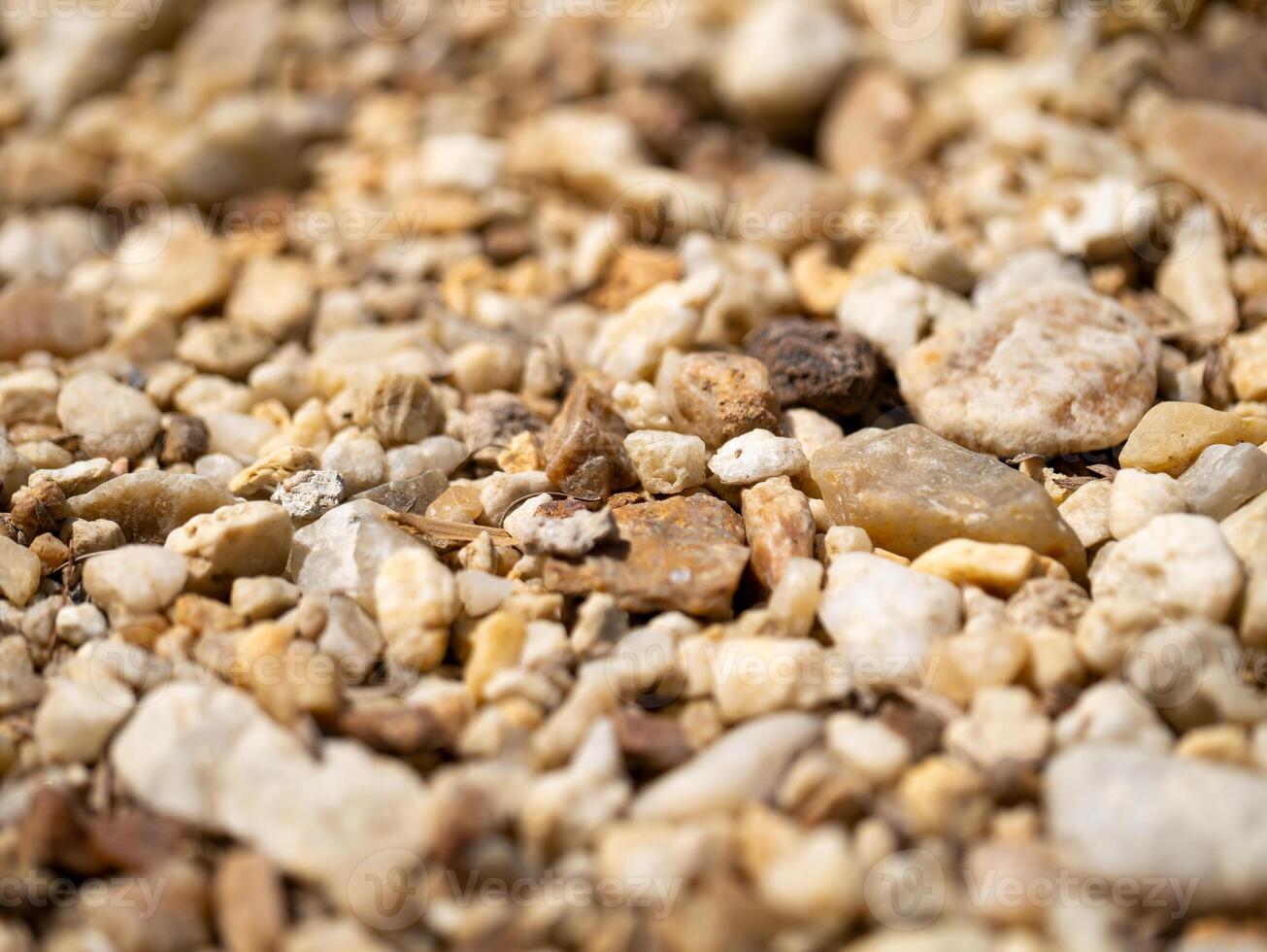 Nature's close-up exploring textured stones and gravel in a beautiful outdoor landscape photo