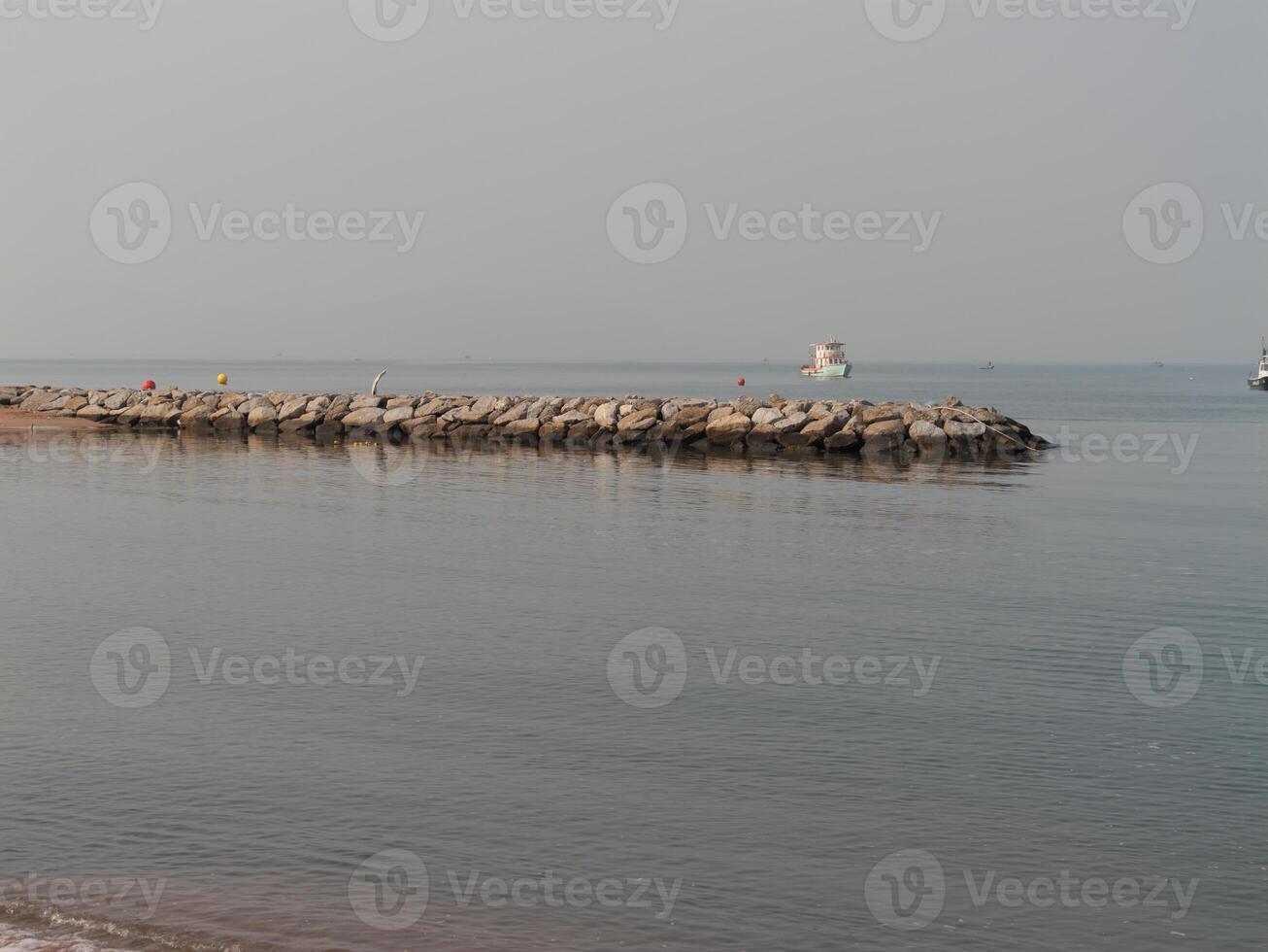 Calm seaside view coastal pathway tranquil serene atmosphere wide angle perspective photo