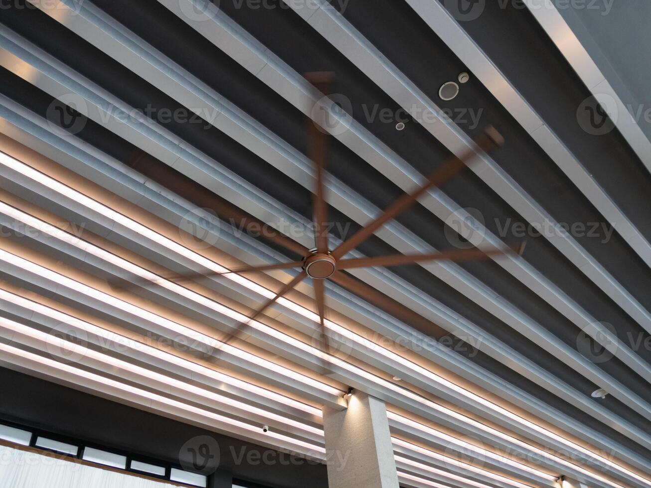 Ceiling fan modern space indoor design contemporary low angle view airflow concept photo