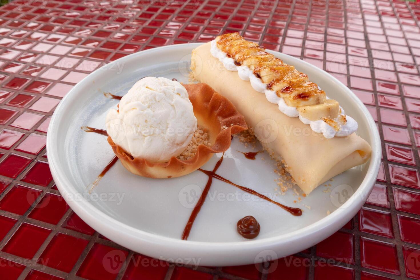 Delightful outdoor dessert platter with ice cream and sweet treats in a bright setting photo