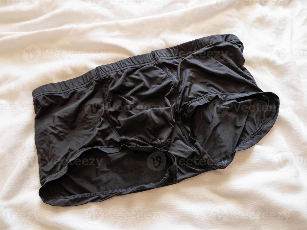 Everyday comfort black boxer shorts a bed lifestyle relaxed environment close-up view photo