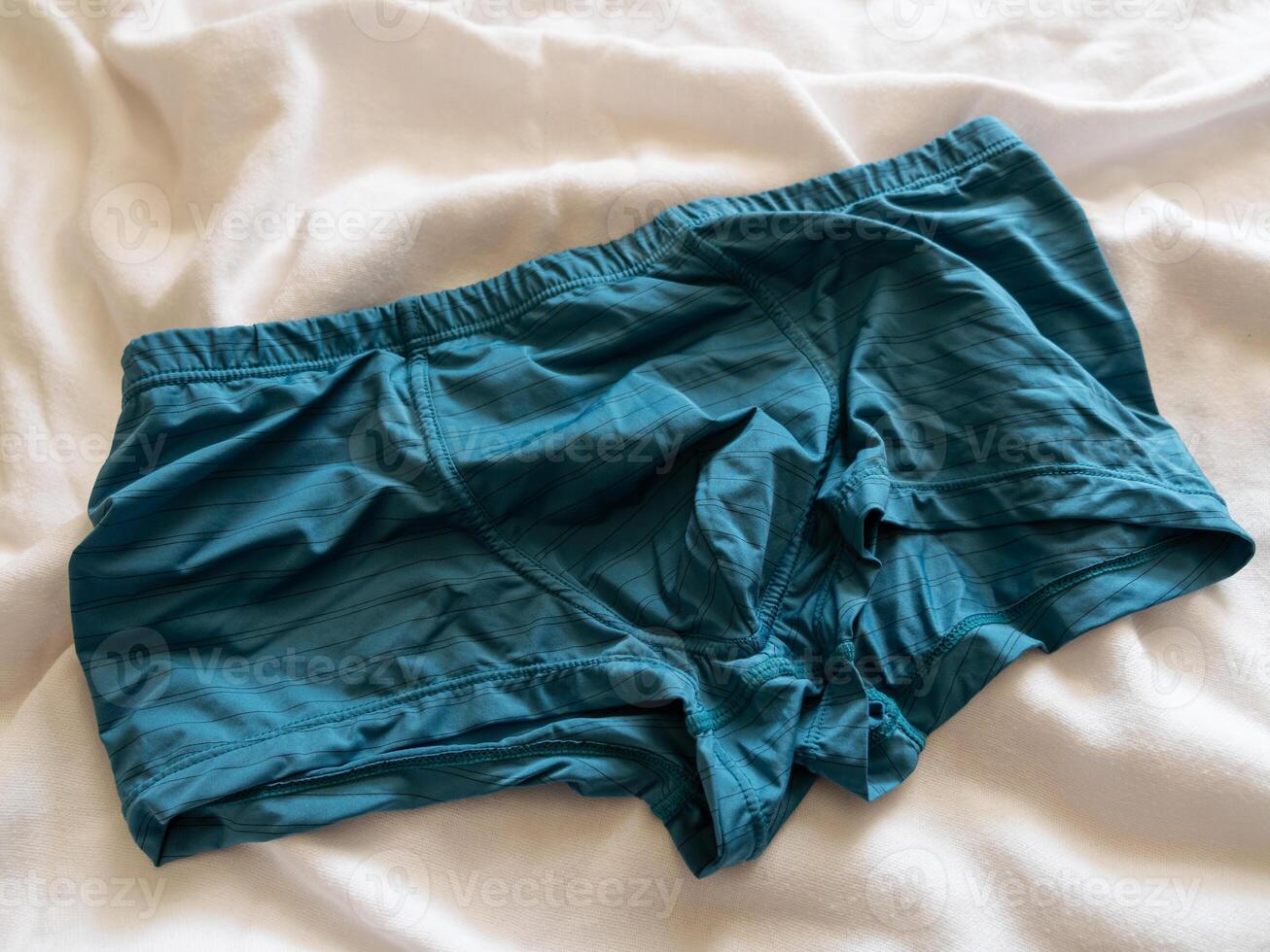 Casual lifestyle event teal underwear bedroom apparel cozy environment close-up comfort concept photo