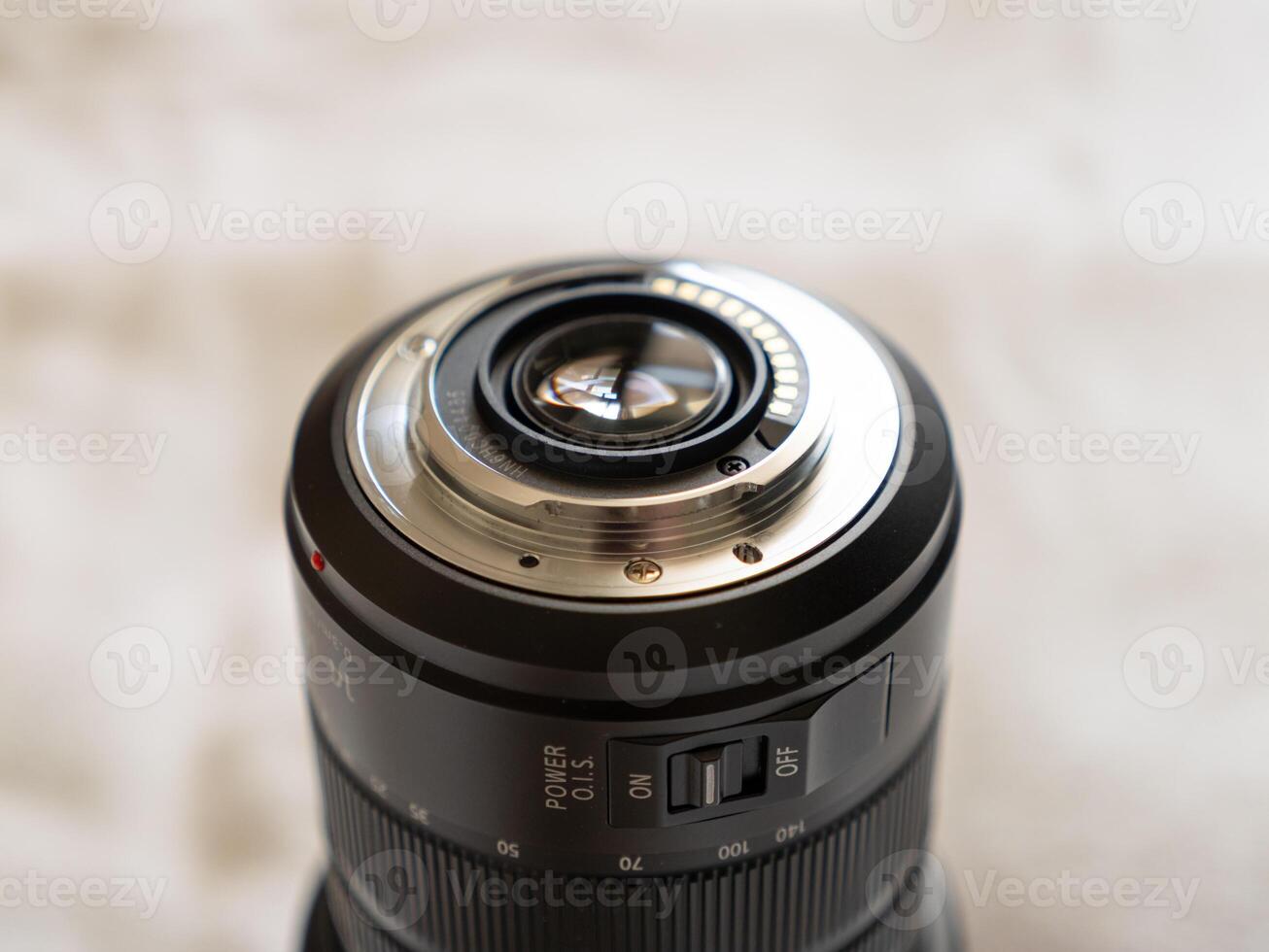 Camera lens close-up studio product showcase indoor macro view detail focus photo
