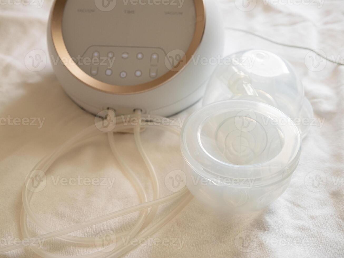 Breast pump machine setup home product showcase comfortable space overhead view parenting essentials photo