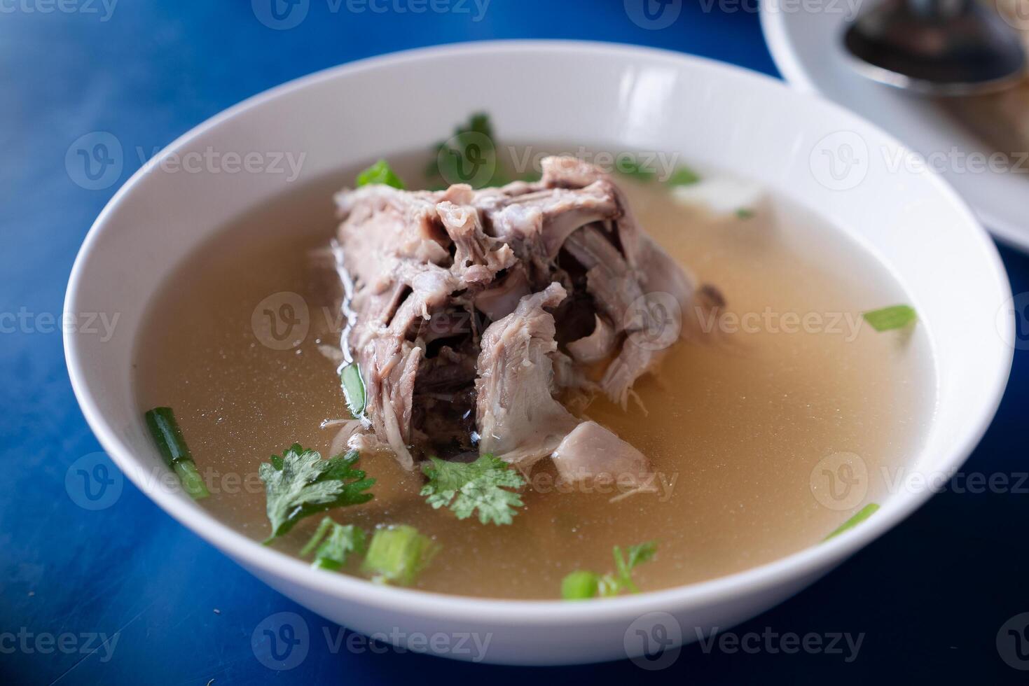 Delicious savory soup local eatery food dish cozy setting close-up view culinary delight photo