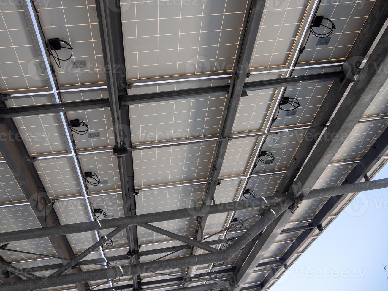 Documenting solar panel installation urban environments an upward view of renewable energy photo