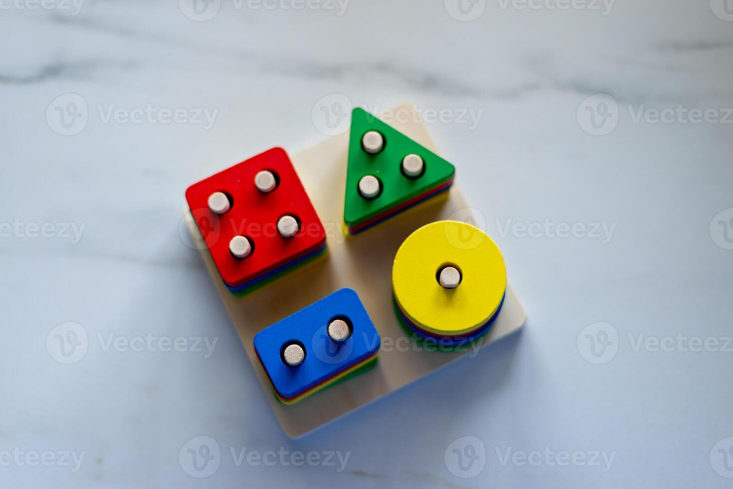 Creative playtime colorful shape sorting toys for kids indoor learning environment photo