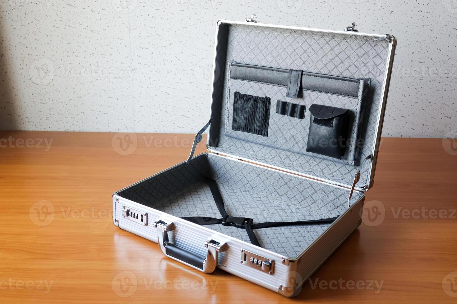 Business briefcase open empty office desk minimalistic space focused perspective photo