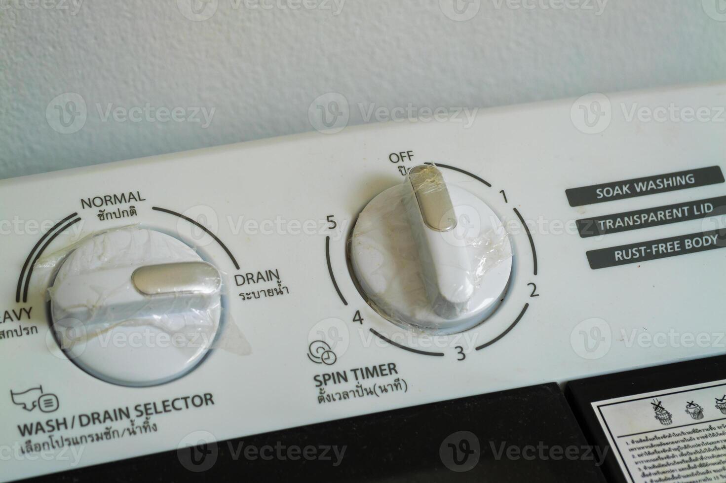 Washing machine control settings home appliance domestic close-up user experience photo
