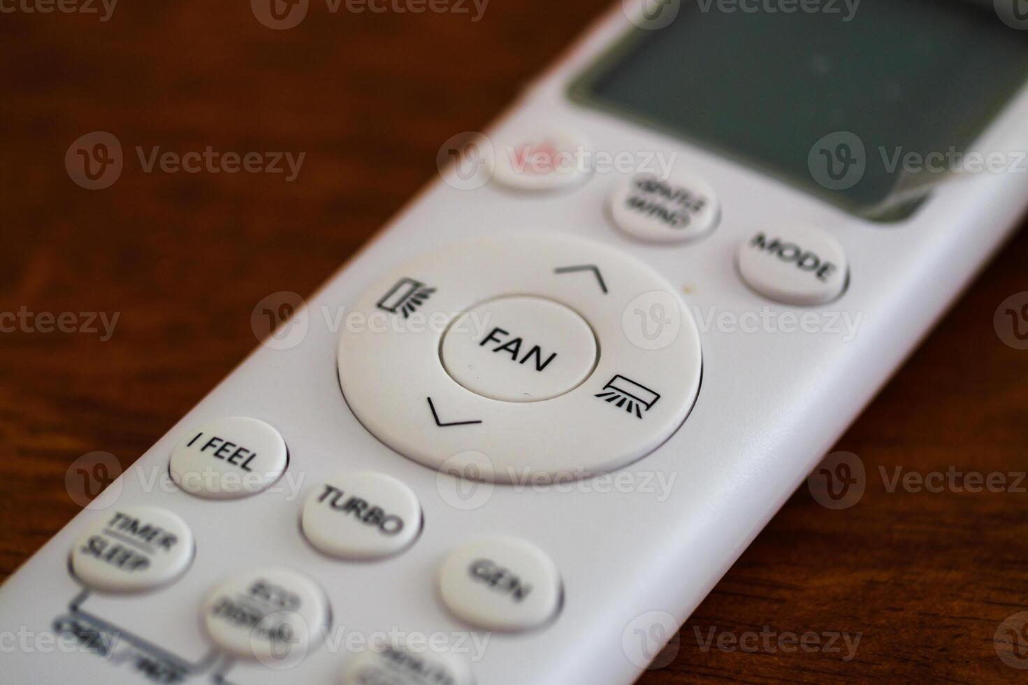 Remote control for fan operation in home environment close-up view technology concept photo