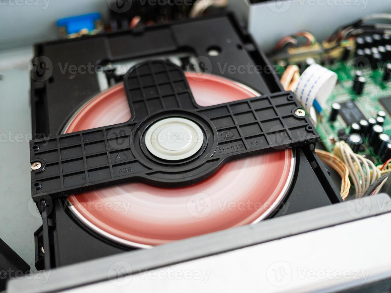 Internal computer cd drive action technology hardware close-up mechanical digital media photo