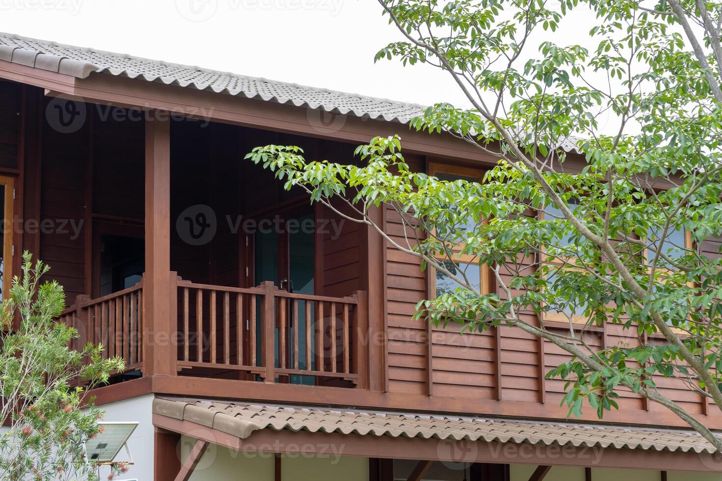 Charming wooden house balcony scenic neighborhood urban outdoor aesthetic appeal photo