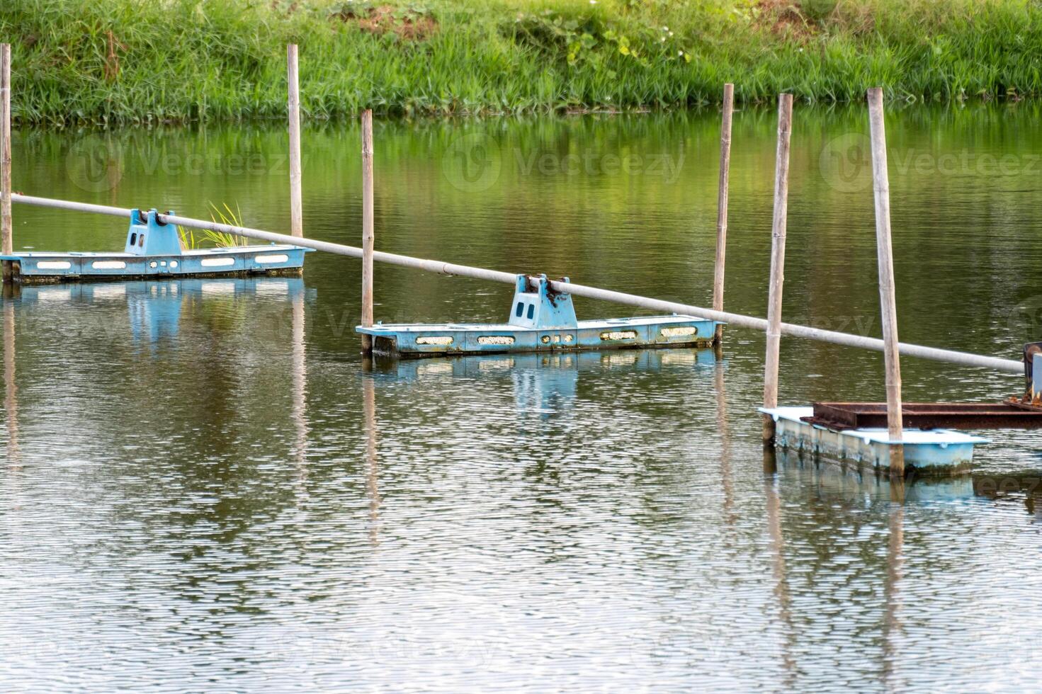 Fishing equipment floating calm water in scenic nature environment tranquil viewpoint photo