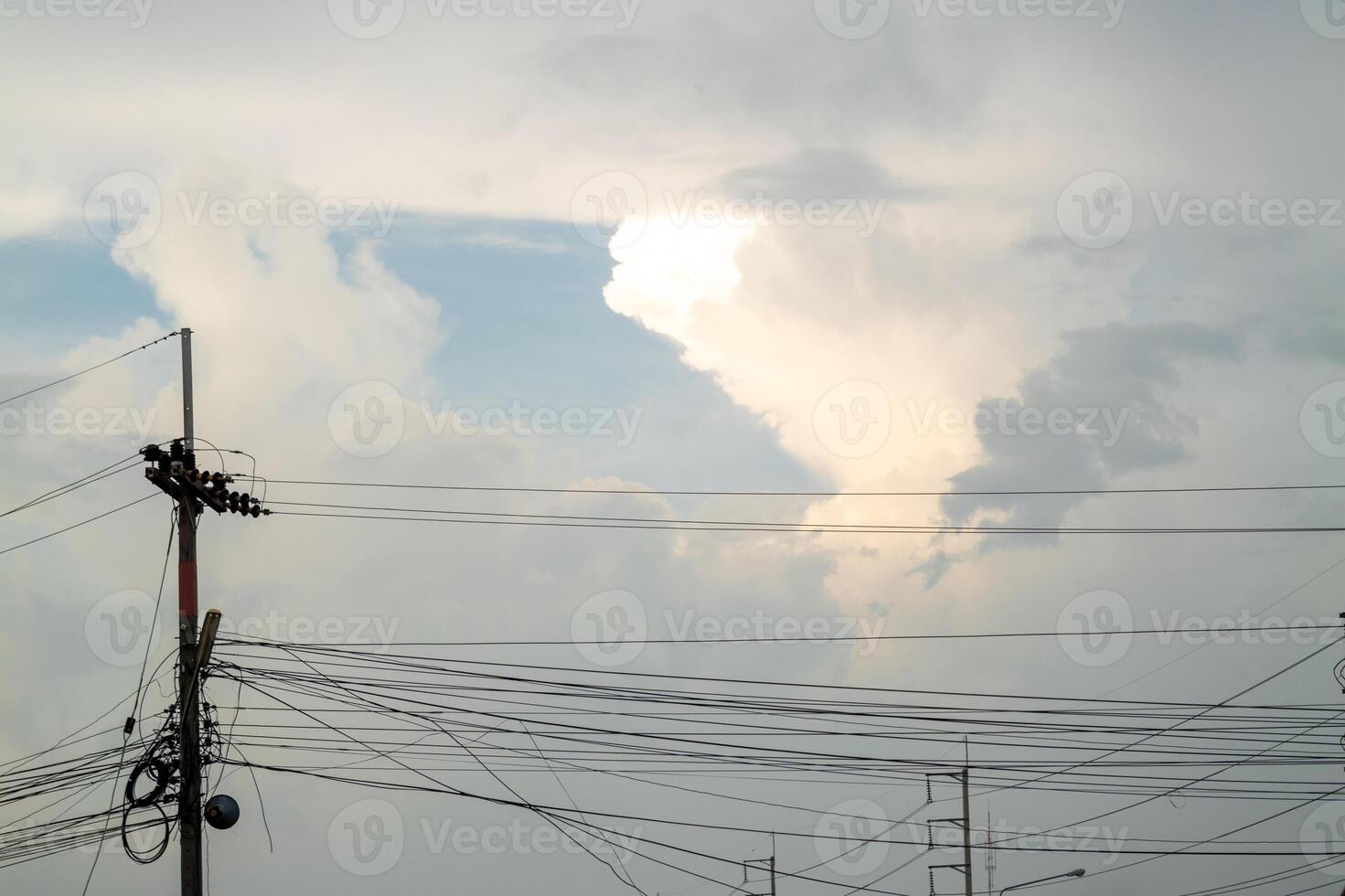 Stormy skies above power lines urban landscape cloudy weather wide angle nature's drama photo