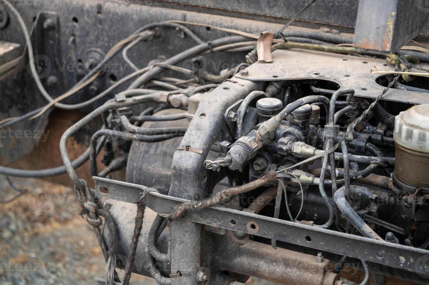 Industrial site close-up maintenance of heavy machinery engine in mechanical environment photo