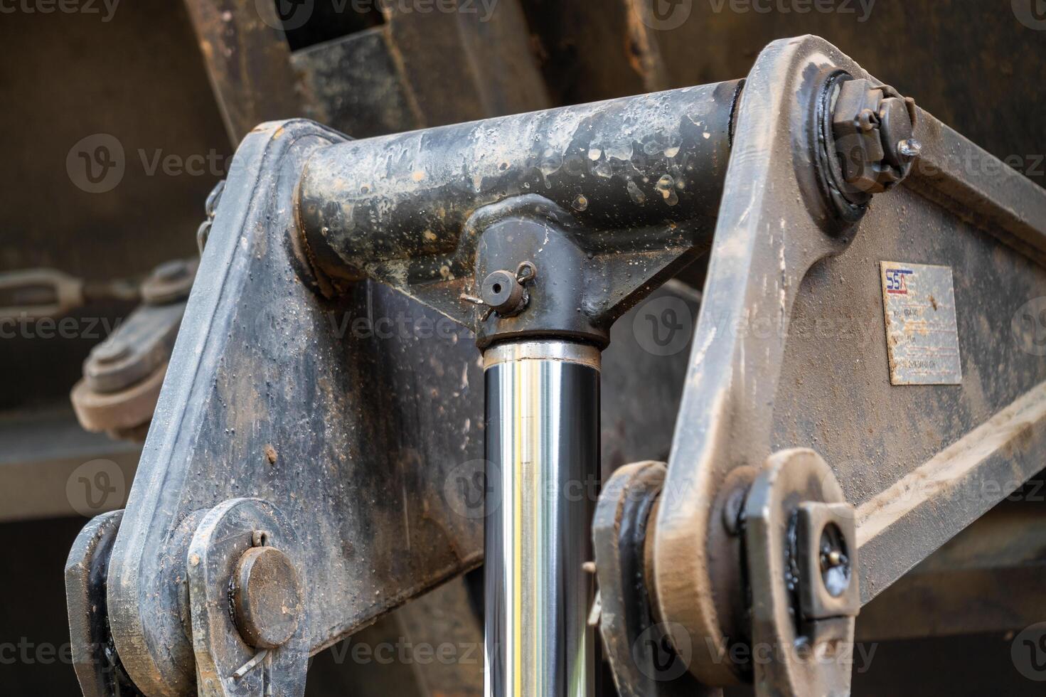 Heavy machinery action close-up construction site equipment in industrial setting photo
