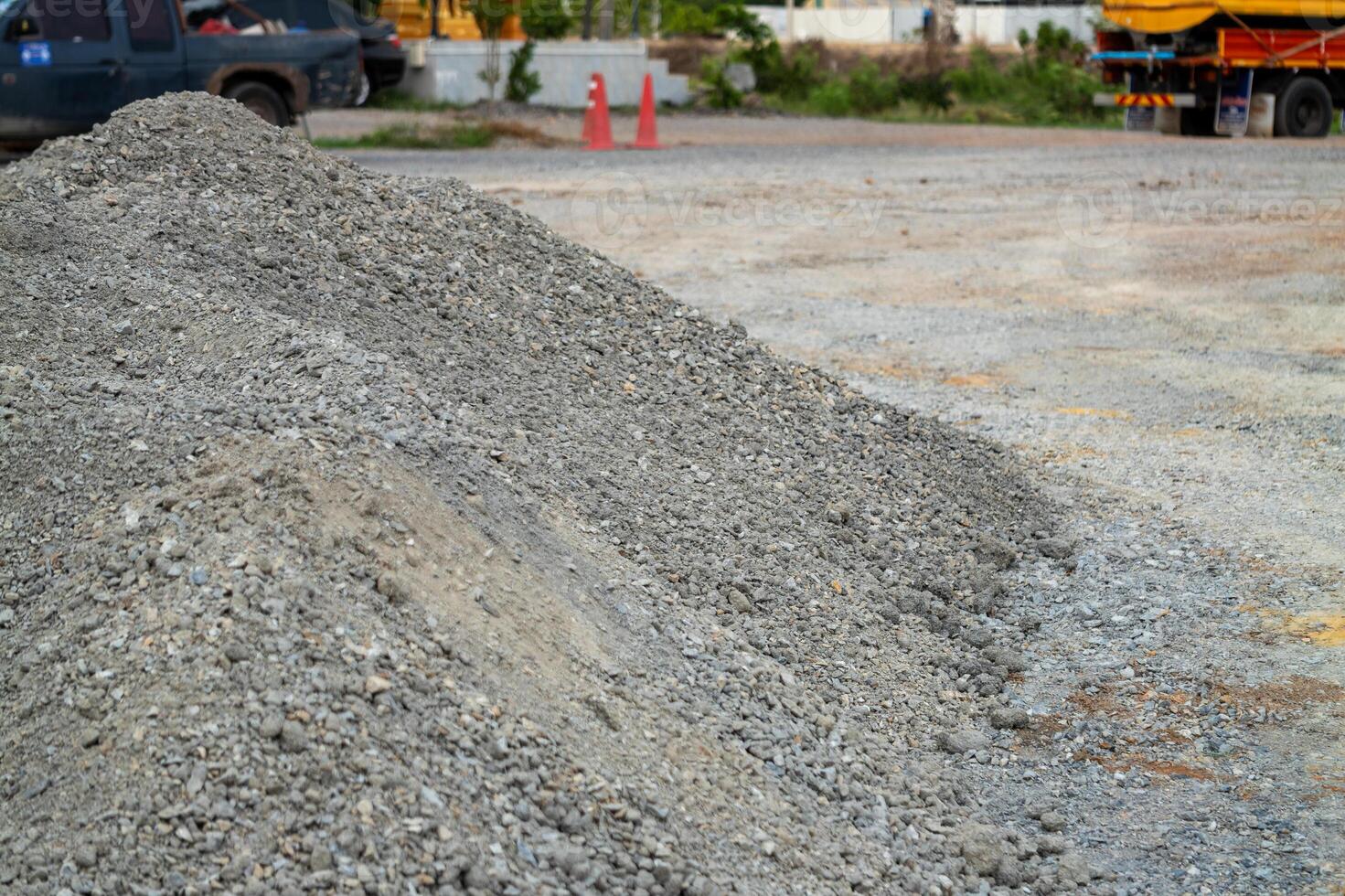 Construction site activity gravel pile urban area daylight low angle building foundations photo