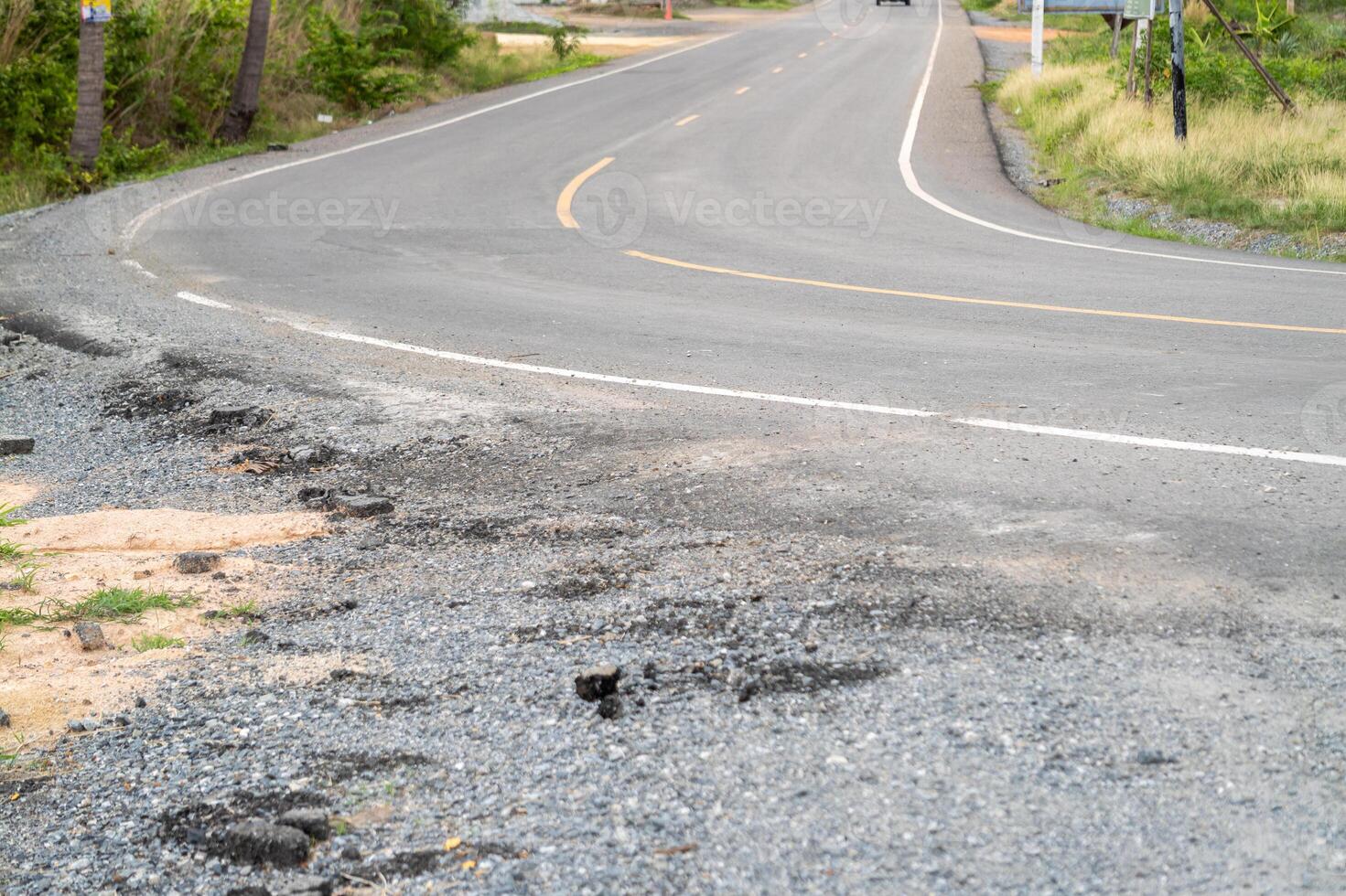 Road conditions and safety concerns rural route outdoor landscape view traffic impact photo