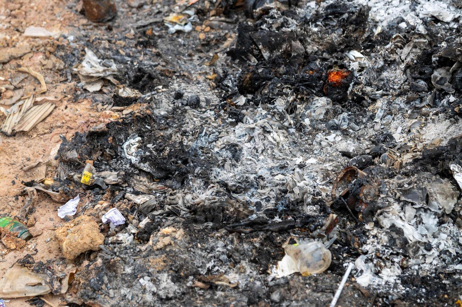 Photographic evidence of urban blaze aftermath debris and ashes in somber atmosphere photo