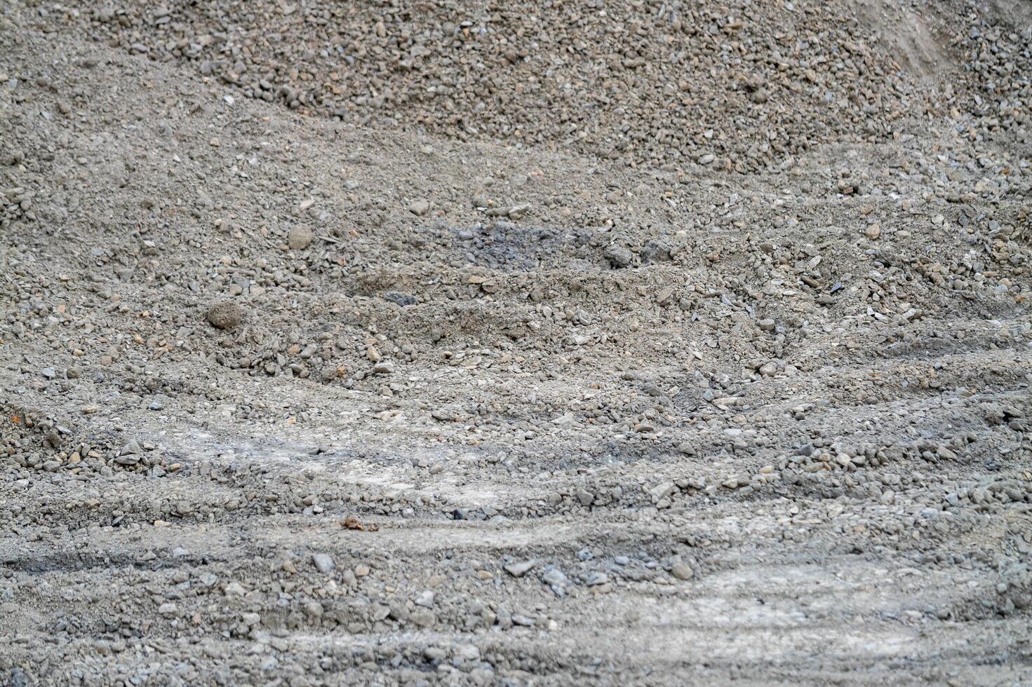 Excavation work construction site urban environment ground material close-up view industrial process photo