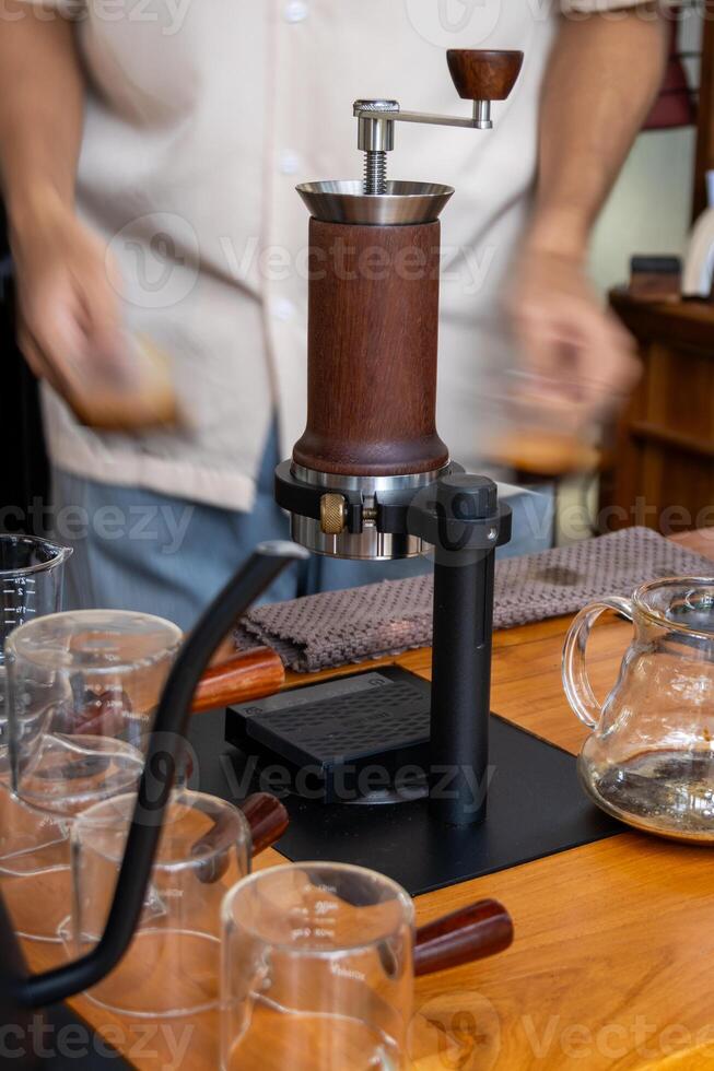 Coffee brewing process coffee shop beverage preparation indoor setting close-up view artisan techniques photo