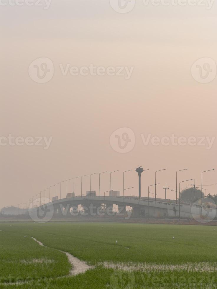 Morning misty landscape rural bridge green fields wide angle nature's serenity photo