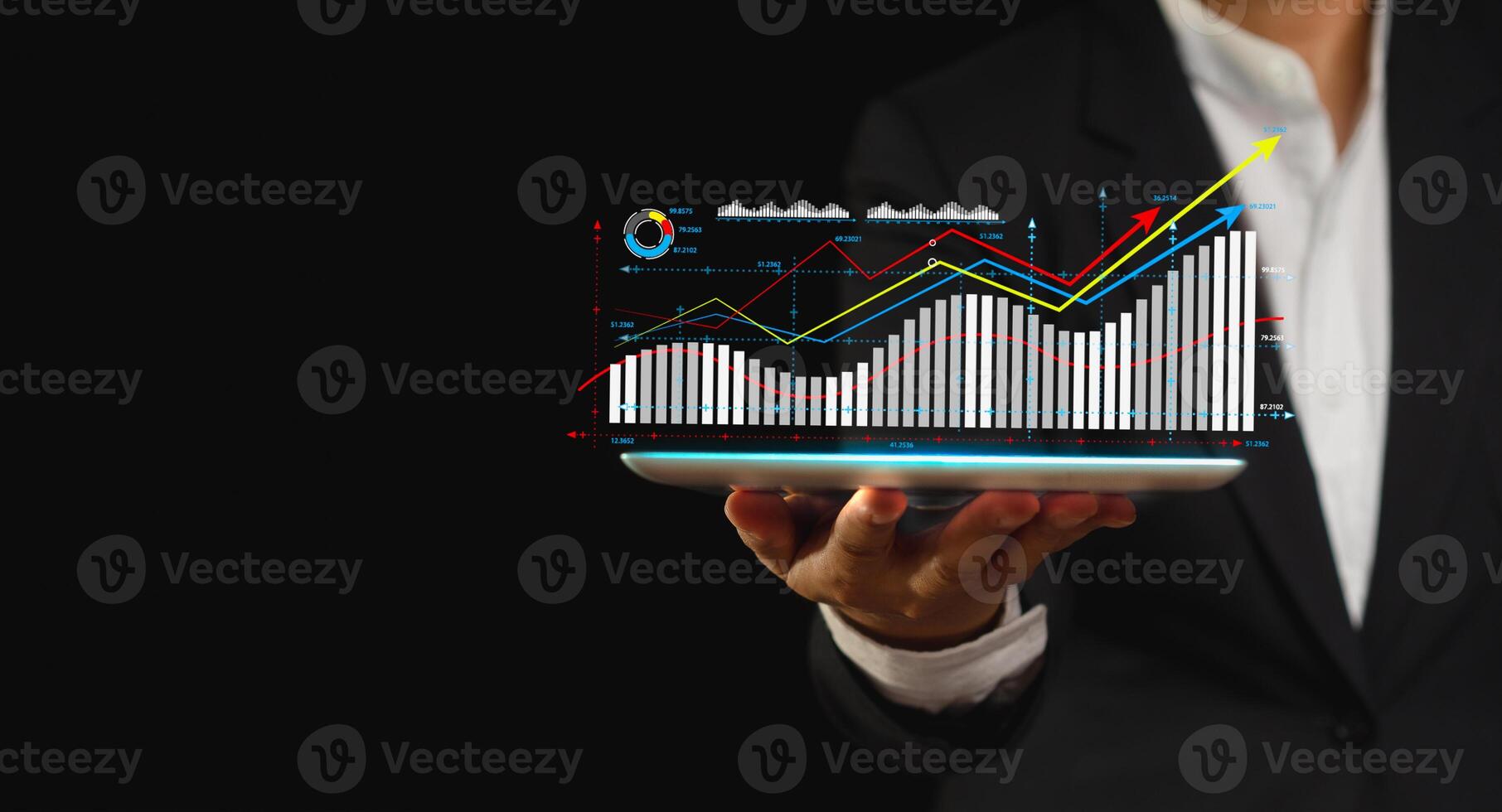 The growth of a business is displayed as a virtual graph on a tablet screen photo