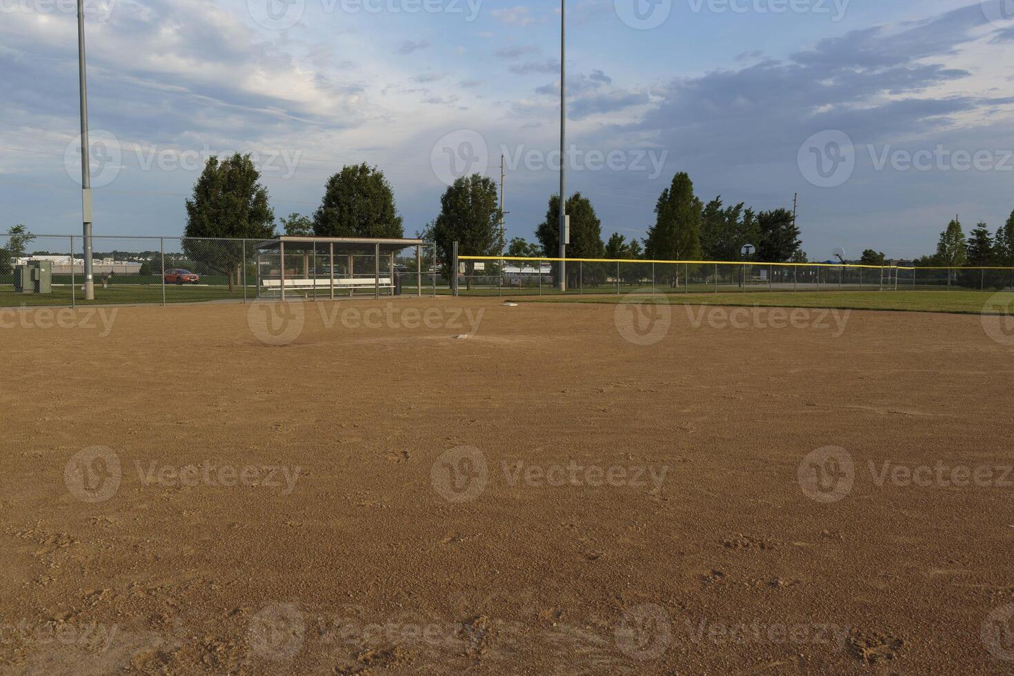 a view from first base to the pitchers mound and third base on a baseball field photo